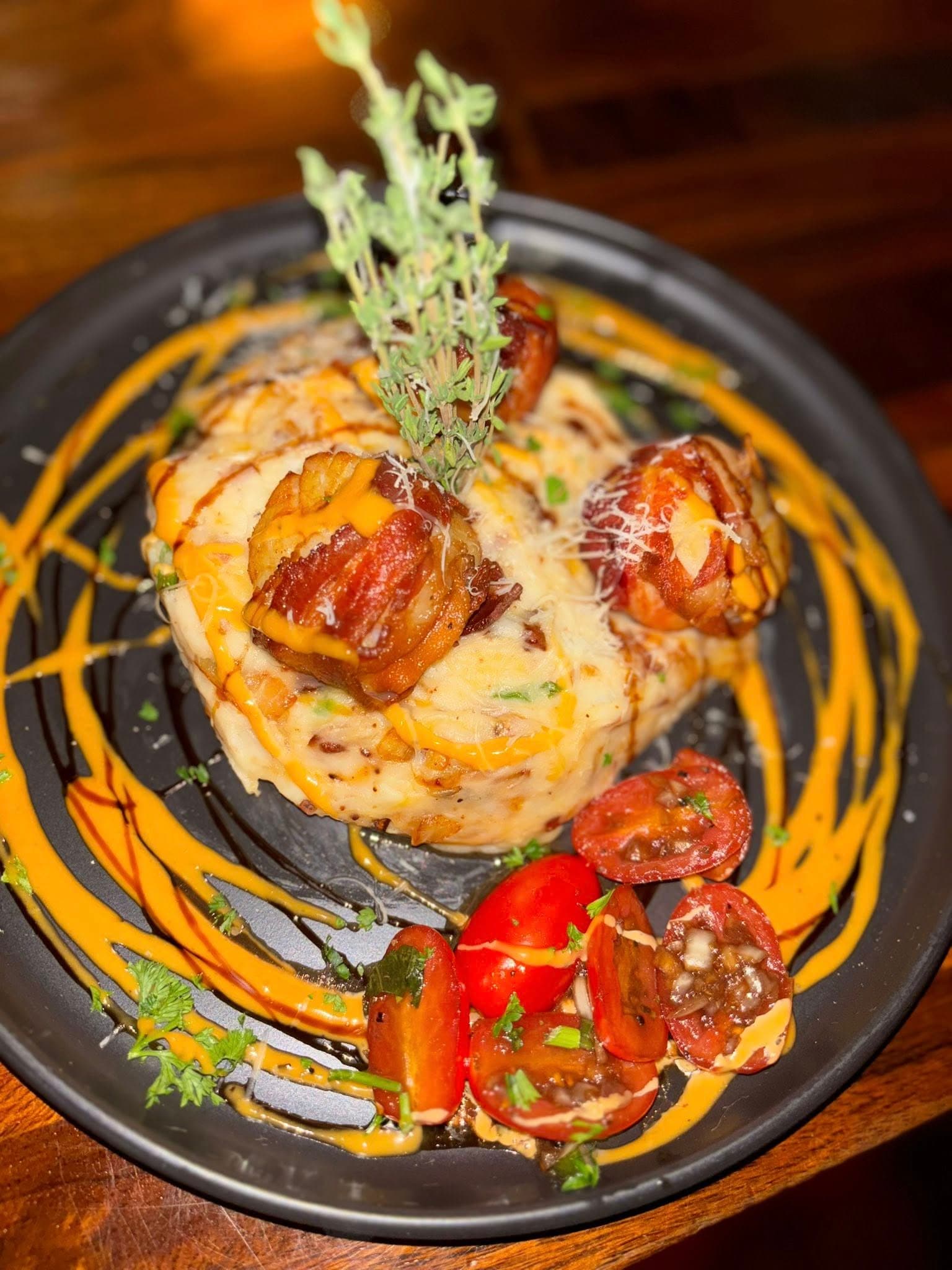 Pan-seared scallops with seasonal vegetables