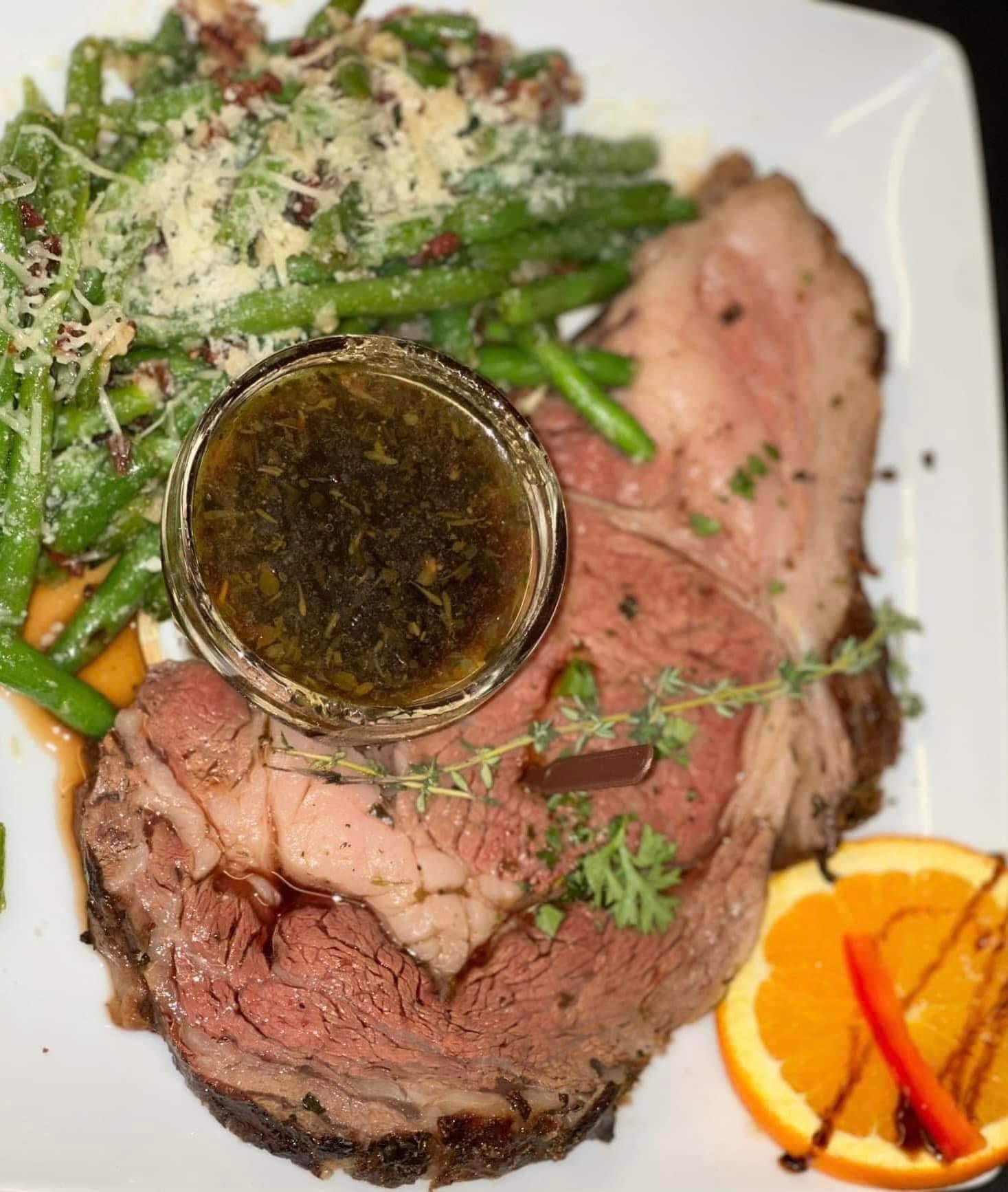Slow-roasted prime rib with herbs and au jus